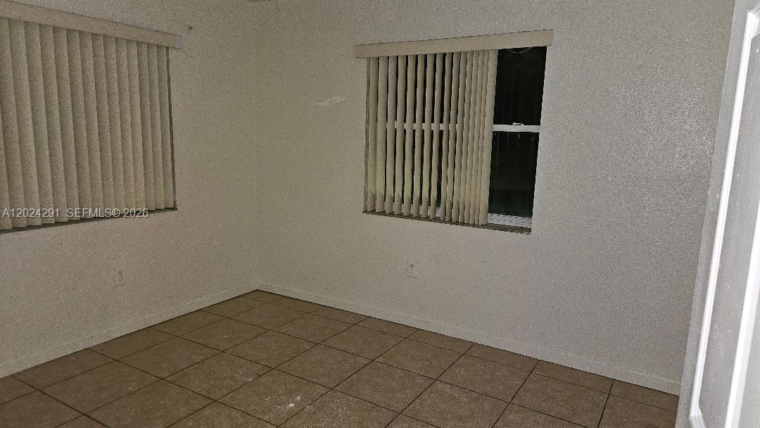 11970 Southwest 217th Street Miami, FL 33170 - Photo 10 of 10 a view of a door in a room