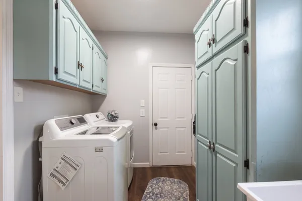 a utility room with dryer and washer