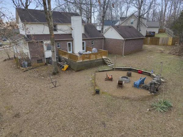 a view of a house with a sink and chairs