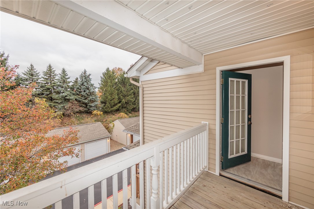 28360 Center Ridge Road, Unit 2210 Westlake, OH 44145 - Photo 42 of 45 Wooden terrace with a garage