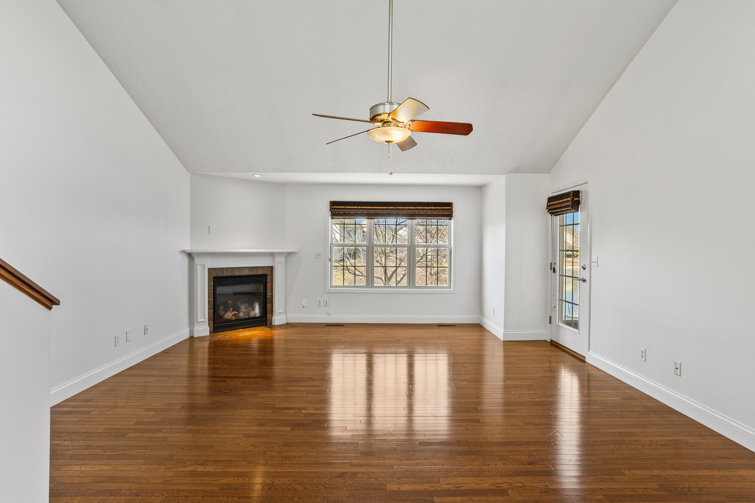 2517 Pembrook Point Champaign, IL 61821 - Photo 15 of 37 a view of an empty room with window and wooden floor