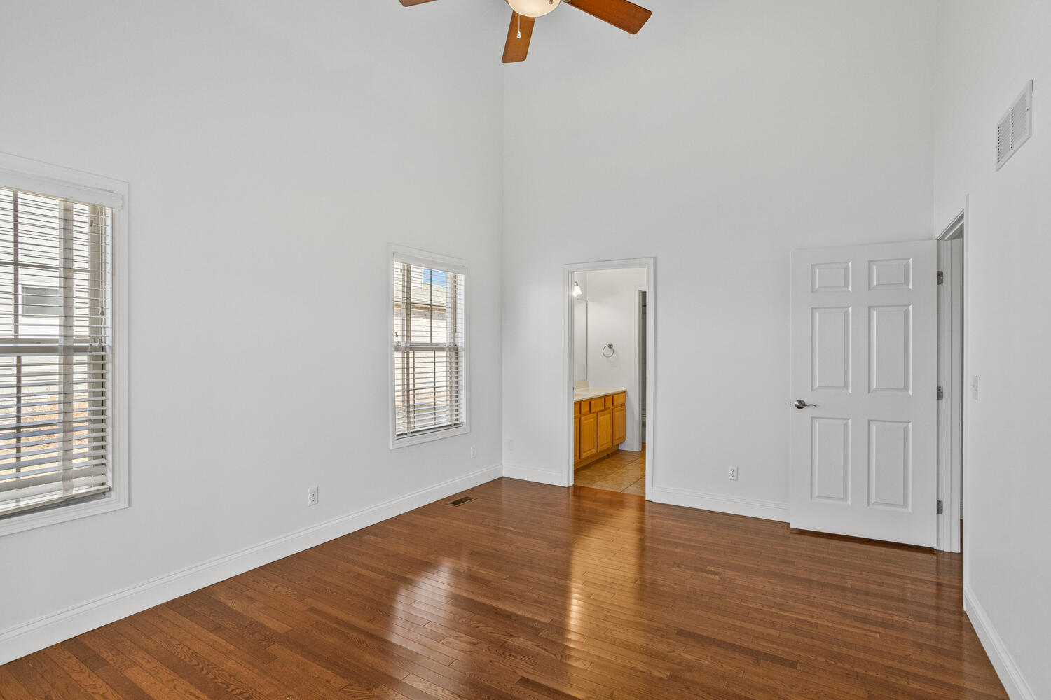 2517 Pembrook Point Champaign, IL 61821 - Photo 18 of 37 wooden floor in an empty room with a window