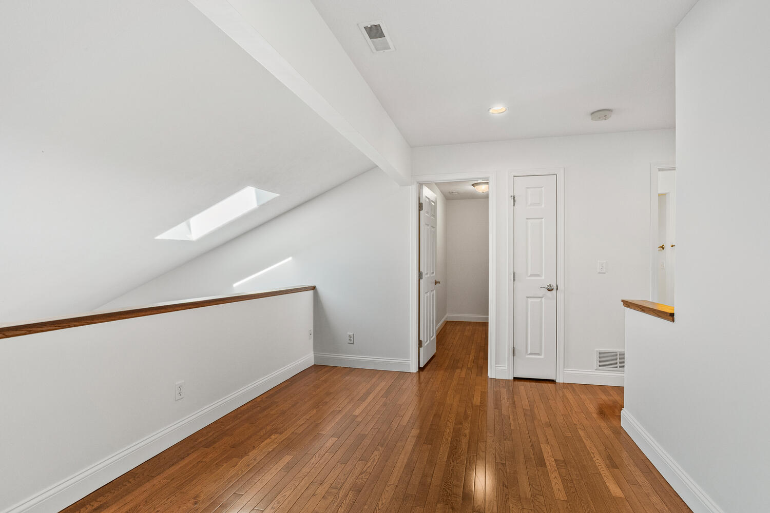 2517 Pembrook Point Champaign, IL 61821 - Photo 22 of 37 a view of an empty room with wooden floor