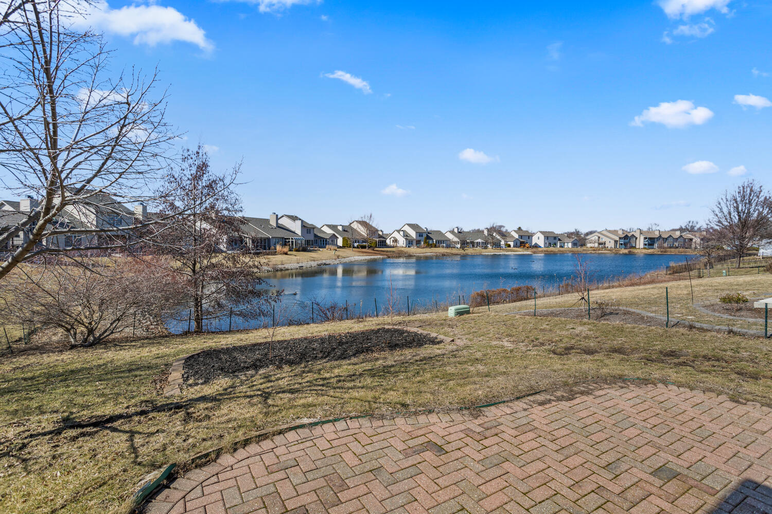 2517 Pembrook Point Champaign, IL 61821 - Photo 6 of 37 a view of a lake with houses
