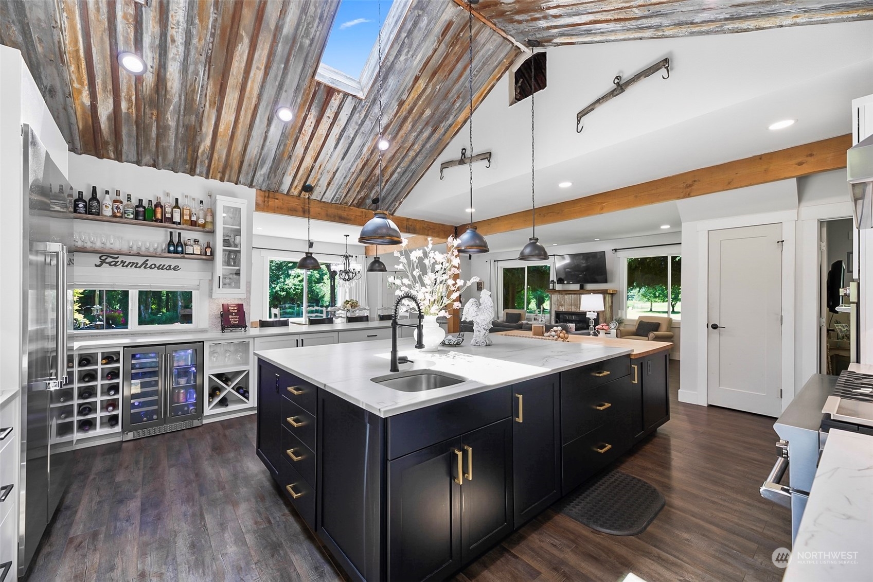 19829 Niederle Road Monroe, WA 98272 - Photo 12 of 39 a large kitchen with a large counter space a sink stainless steel appliances and cabinets