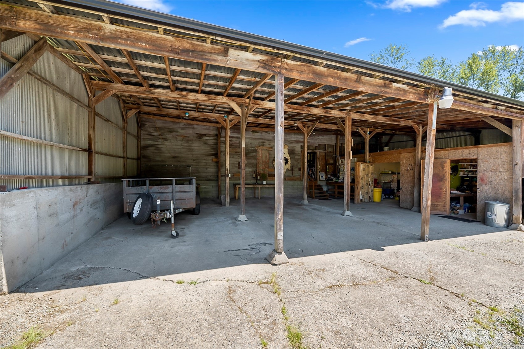 19829 Niederle Road Monroe, WA 98272 - Photo 34 of 39 a view of a patio with table and chairs