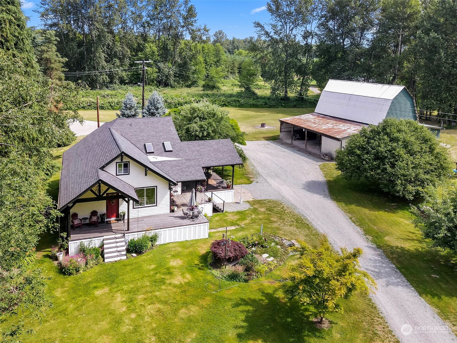 19829 Niederle Road Monroe, WA 98272 - Photo 38 of 39 an aerial view of a house with swimming pool garden and patio
