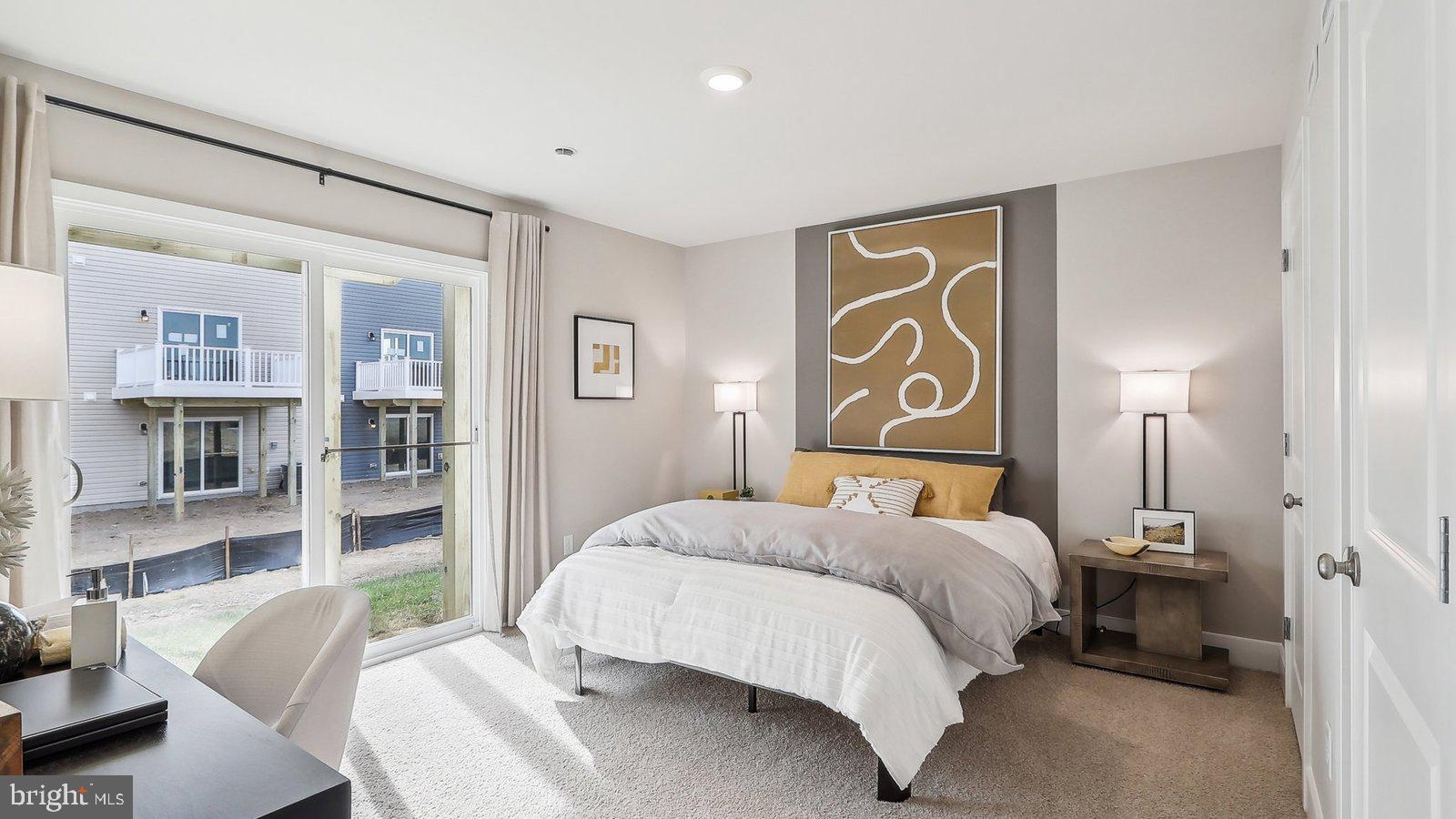 172 Munsee Circle Winchester, VA 22602 - Photo 11 of 21 a bedroom with a bed and a lamp on table