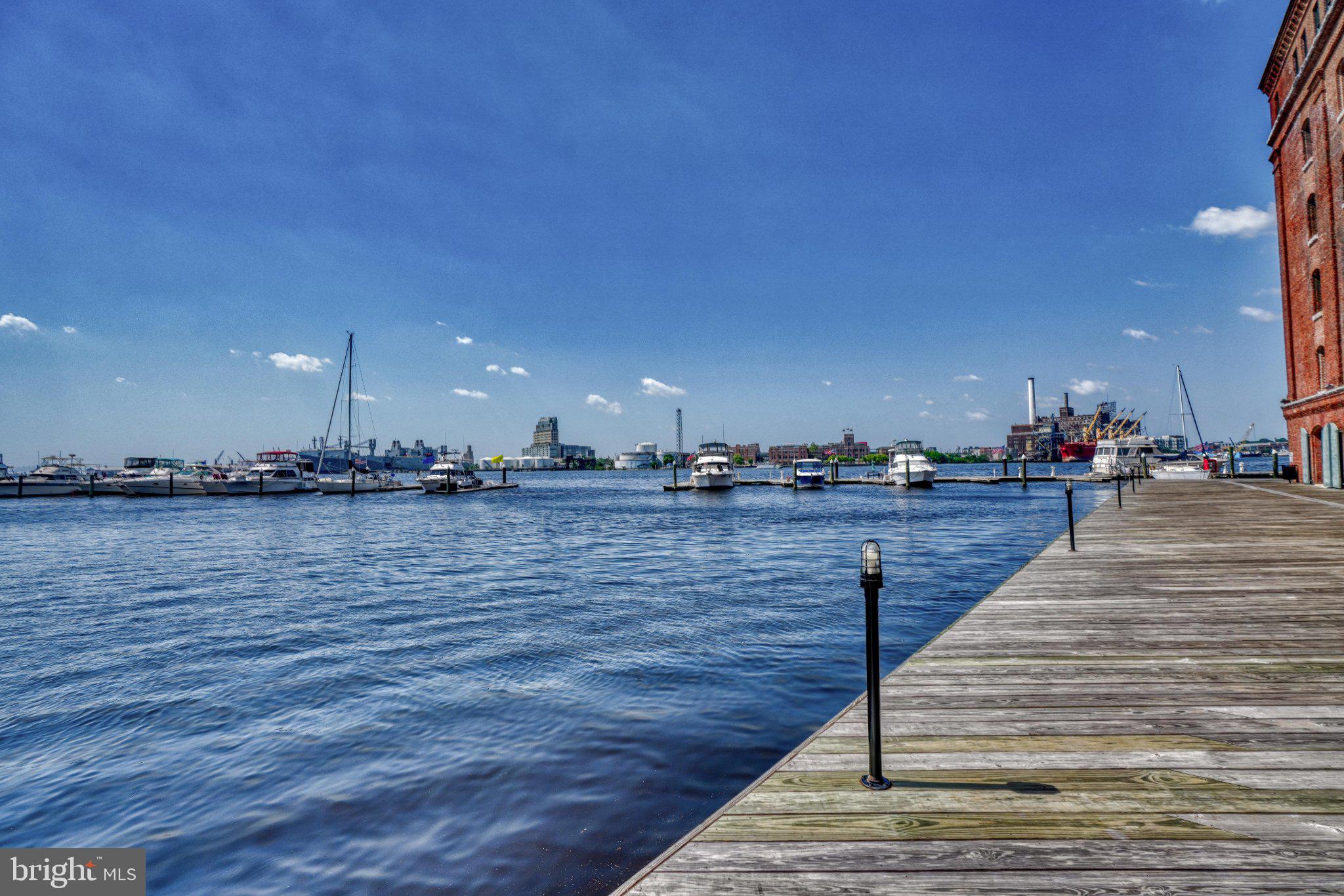 960 Fell Street, Unit 308 Baltimore, MD 21231 - Photo 33 of 38 Serene waterfront with boats docked.