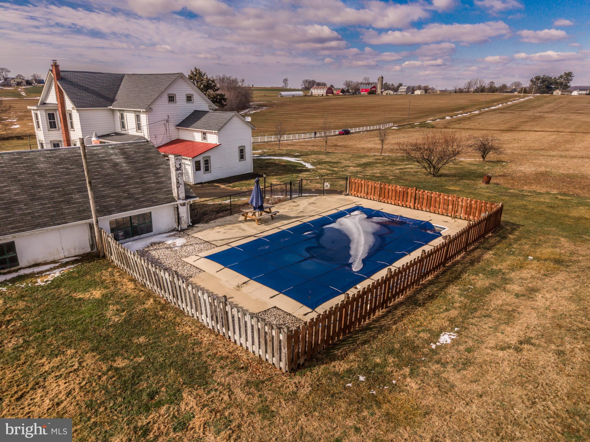 397 Jackson Road Quarryville, PA 17566 - Photo 34 of 41 a view of a pool with sitting area