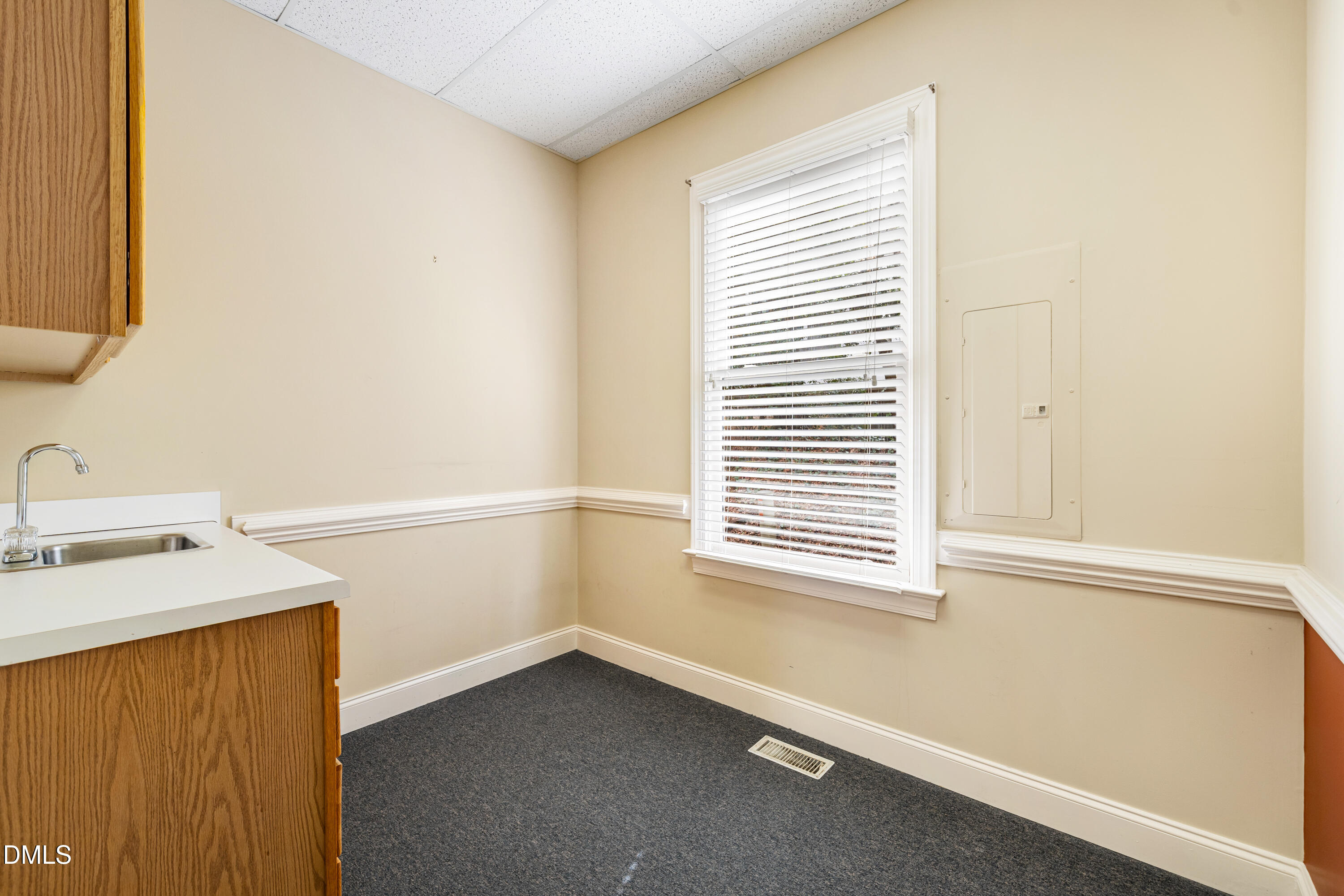 130 Salem Towne Court Apex, NC 27502 - Photo 12 of 36 a bathroom with a sink and a window
