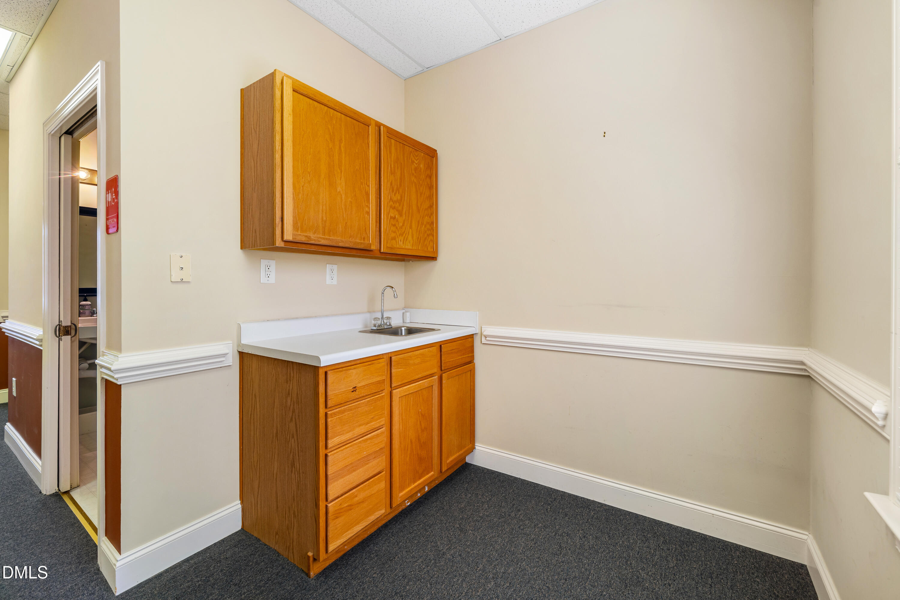 130 Salem Towne Court Apex, NC 27502 - Photo 13 of 36 a bathroom with a sink a vanity and a mirror
