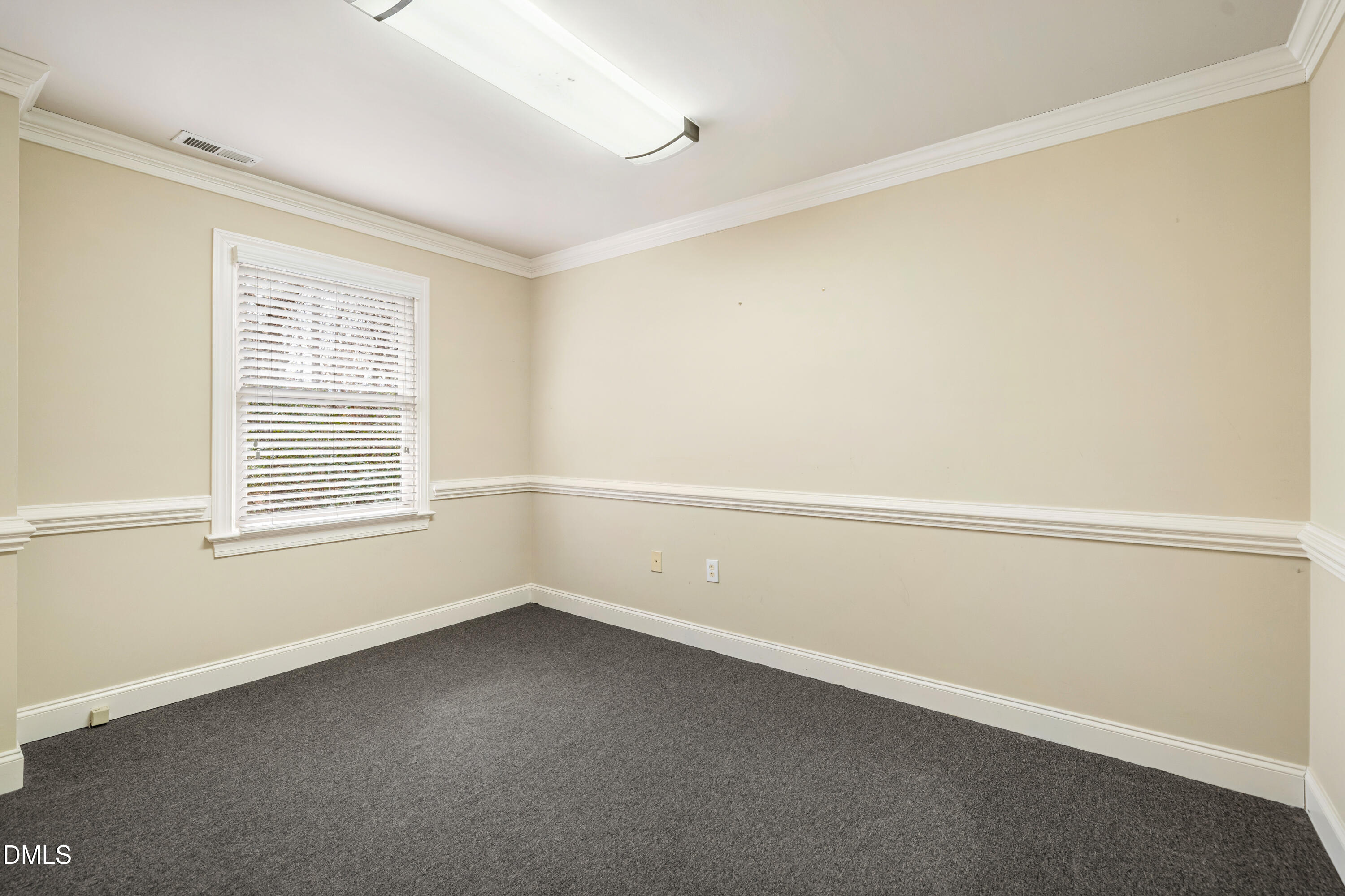 130 Salem Towne Court Apex, NC 27502 - Photo 17 of 36 a view of an empty room with a window