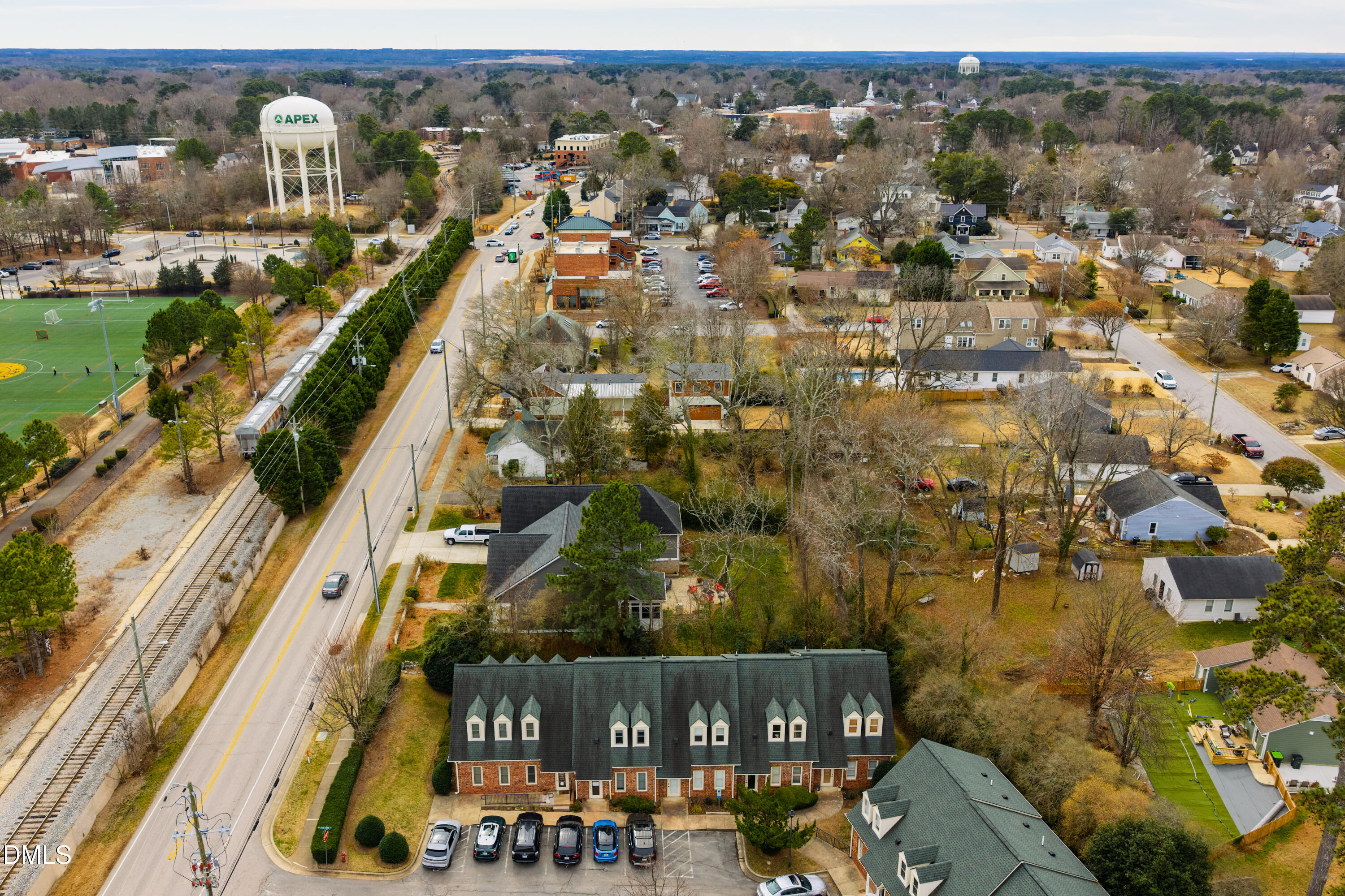 130 Salem Towne Court Apex, NC 27502 - Photo 24 of 36 an aerial view of residential houses with outdoor space