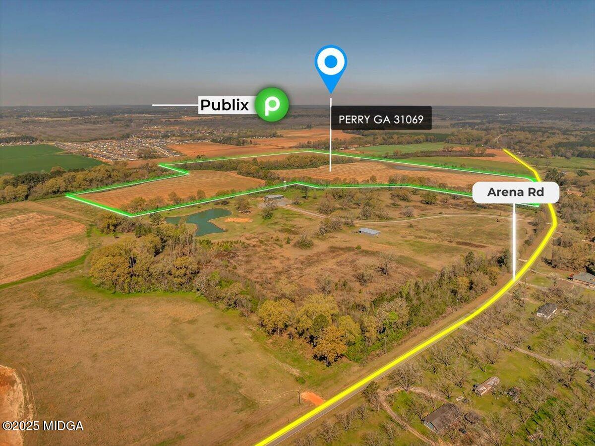 405 Arena Road Perry, GA 31069 - Photo 2 of 31 a view of a swimming pool