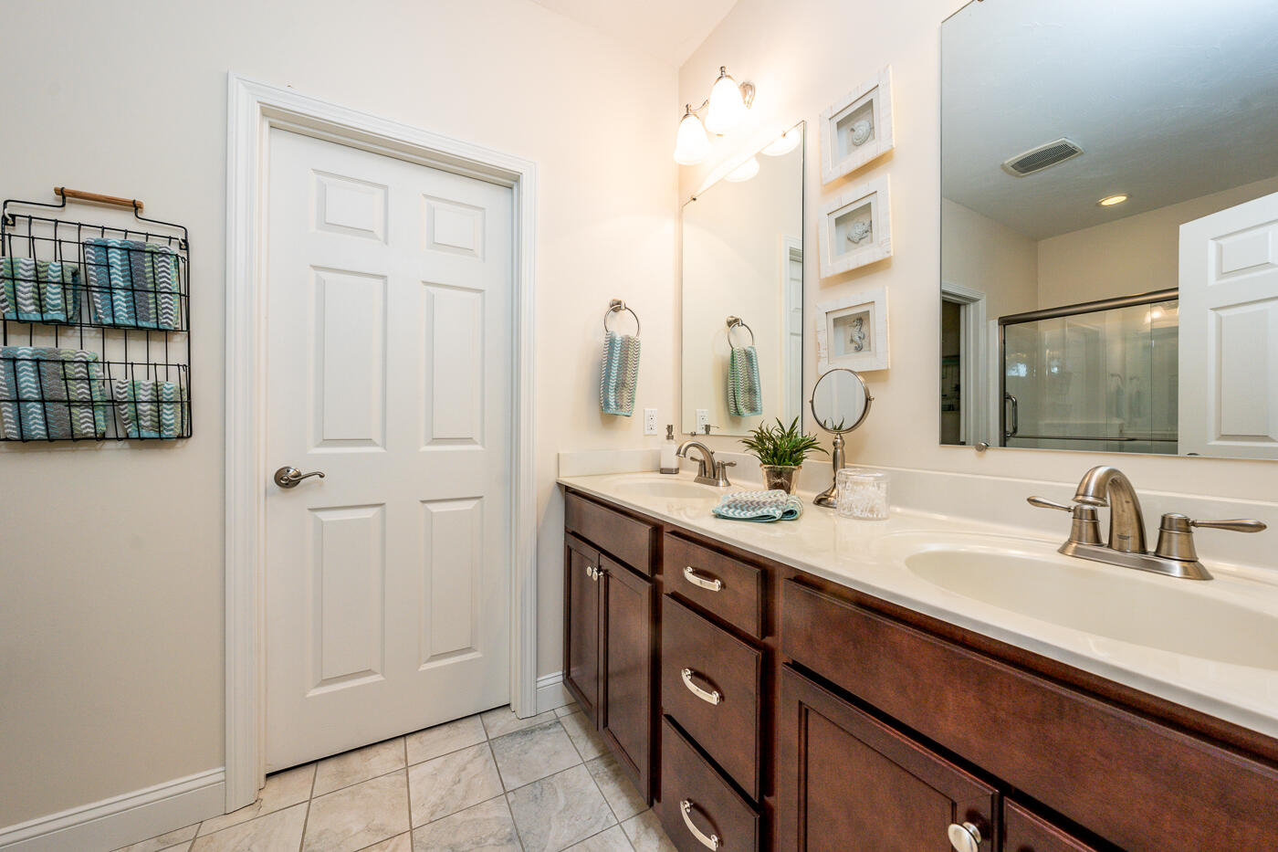 36 Southport Drive Mashpee, MA 02649 - Photo 13 of 21 a bathroom with a double vanity sink and a mirror