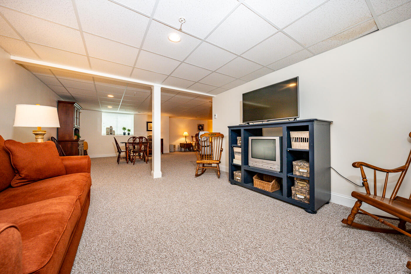 36 Southport Drive Mashpee, MA 02649 - Photo 17 of 21 a living room with furniture and a flat screen tv