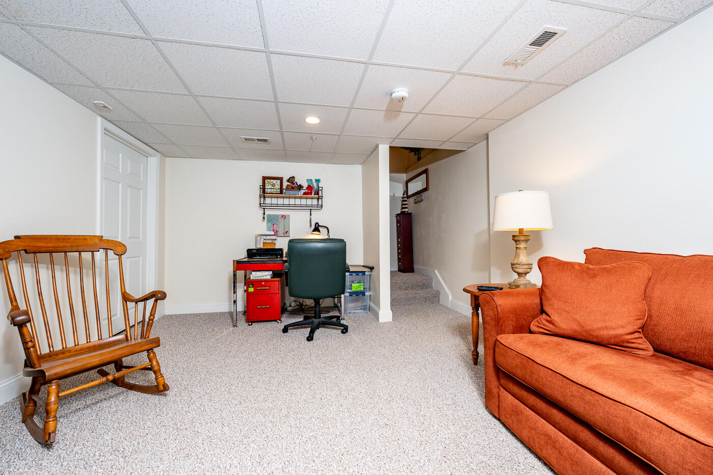 36 Southport Drive Mashpee, MA 02649 - Photo 18 of 21 a living room with furniture and a chair