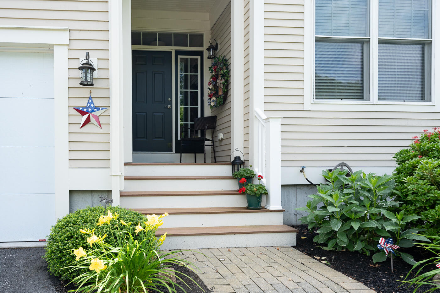 36 Southport Drive Mashpee, MA 02649 - Photo 2 of 21 a front view of a house with plants