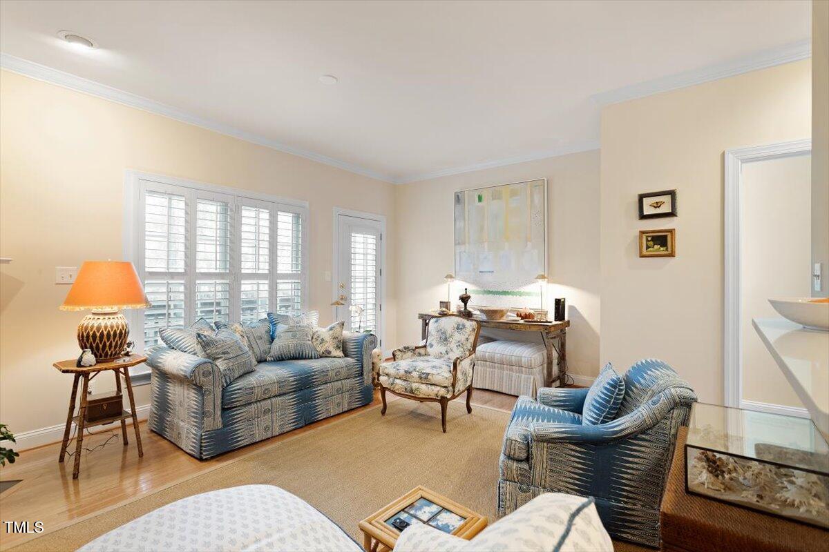 1307 Cameron View Court Raleigh, NC 27607 - Photo 9 of 26 a living room with furniture and a window
