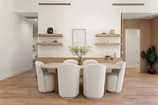 a bathroom with a double vanity sink mirror and bathtub