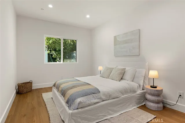 a front view of a house with swimming pool having outdoor seating