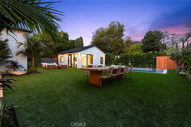 a view of swimming pool with outdoor seating