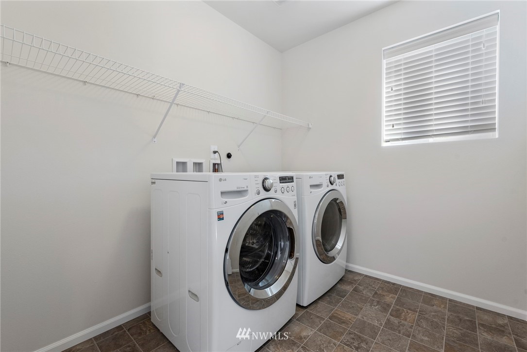 3910 177th Street Southeast Bothell, WA 98012 - Photo 16 of 27 a utility room with dryer and washer