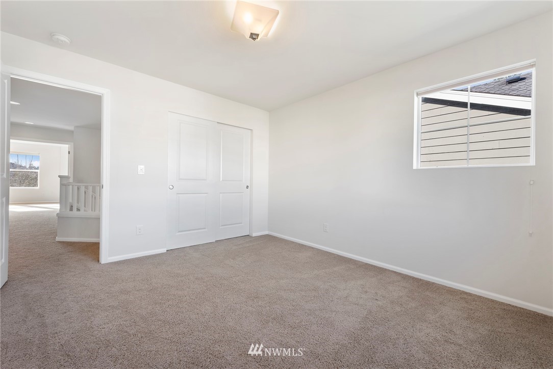 3910 177th Street Southeast Bothell, WA 98012 - Photo 20 of 27 an empty room with windows