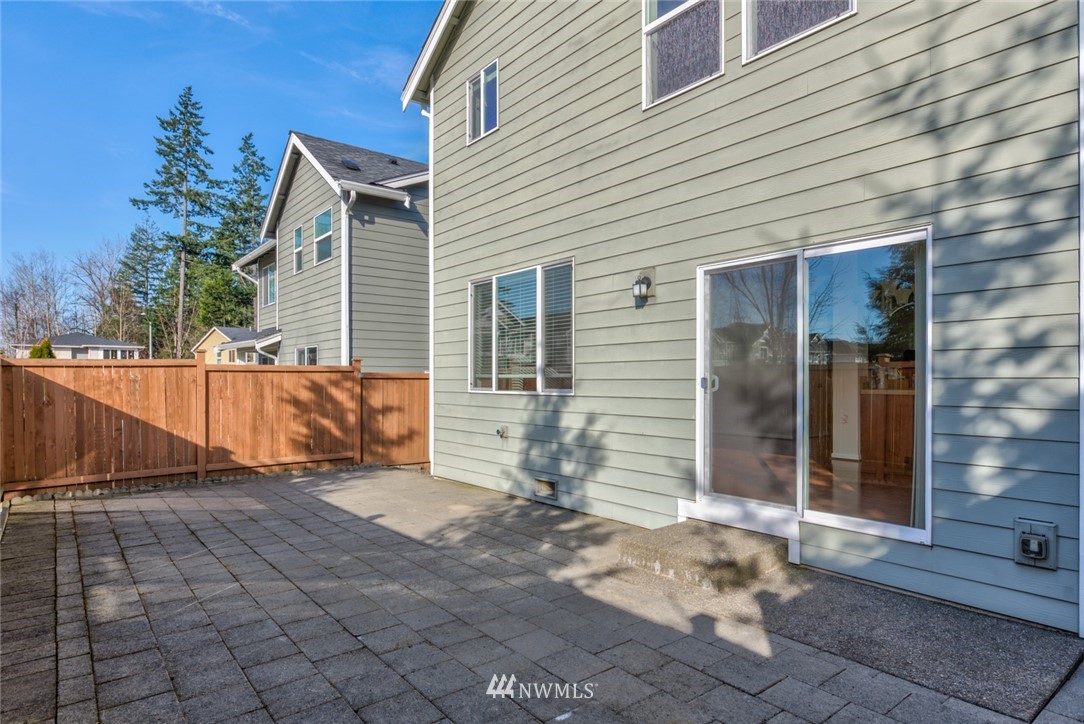 3910 177th Street Southeast Bothell, WA 98012 - Photo 22 of 27 a view of a house with backyard and sitting area