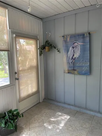 a view of a garage room and a window
