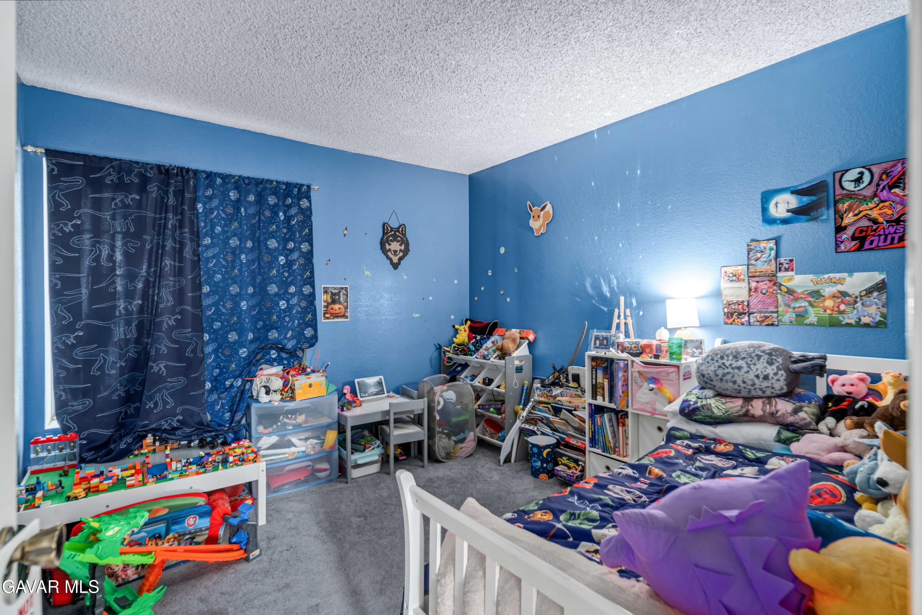20539 East Ave R Palmdale, CA 93591 - Photo 31 of 55 a room with toys and toys
