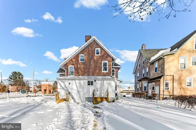 a view of a street with houses