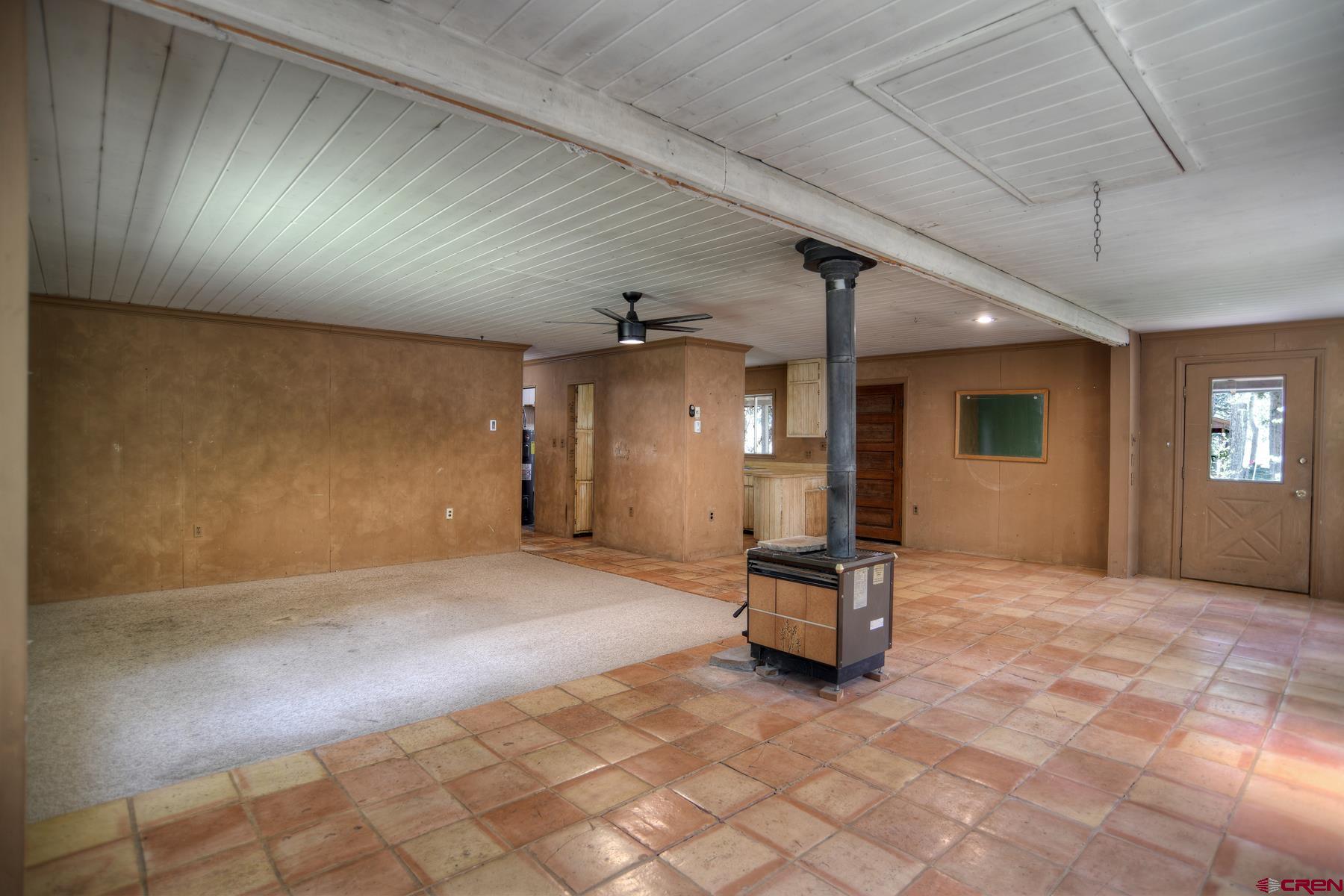 207 Verde Lane Durango, CO 81301 - Photo 17 of 45 an empty room with windows