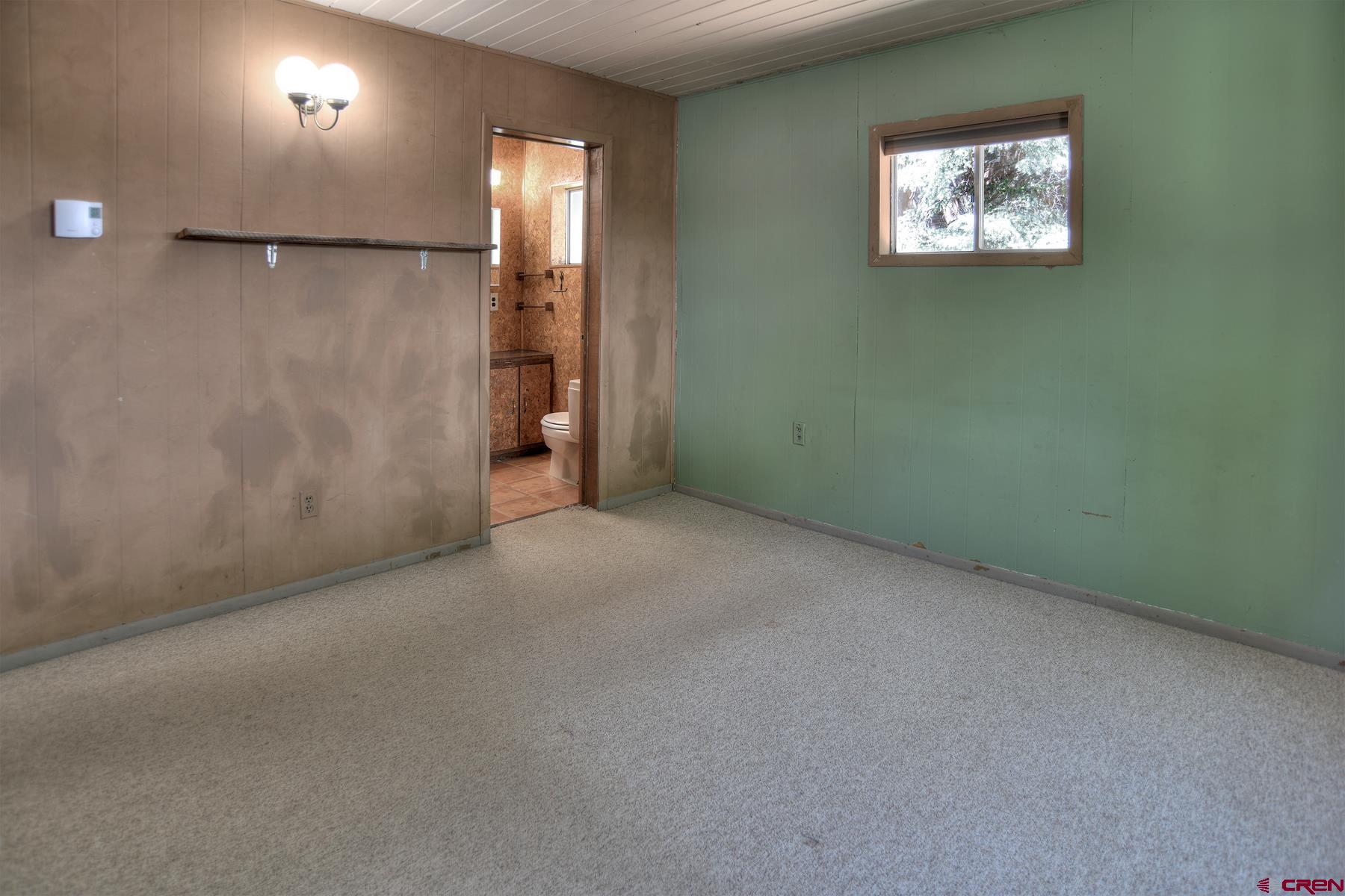 207 Verde Lane Durango, CO 81301 - Photo 23 of 45 a view of a hallway with a small space
