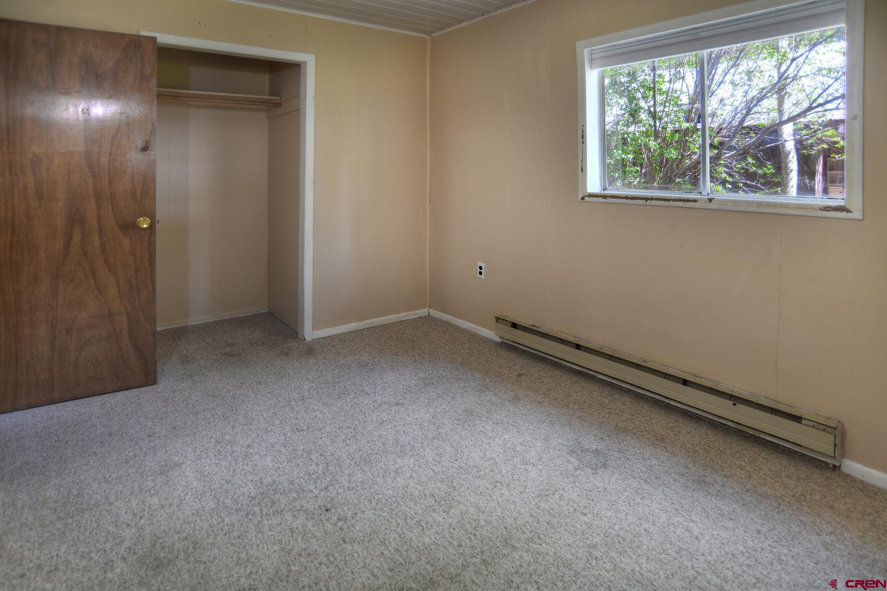 207 Verde Lane Durango, CO 81301 - Photo 28 of 45 an empty room with a window