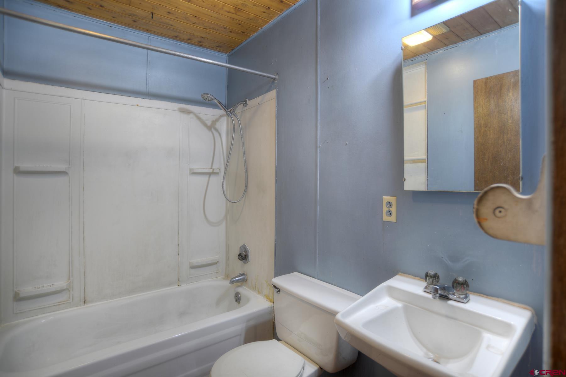 207 Verde Lane Durango, CO 81301 - Photo 30 of 45 a bathroom with a sink toilet and shower