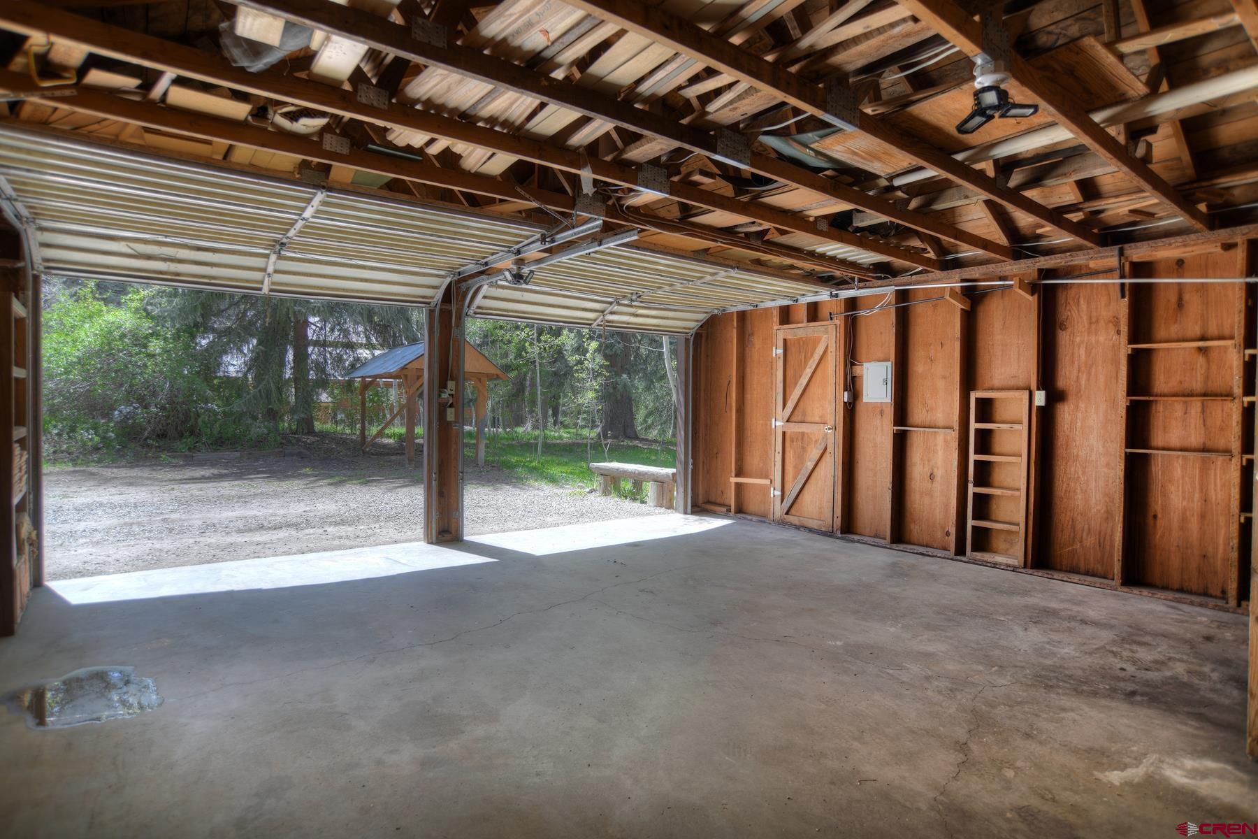 207 Verde Lane Durango, CO 81301 - Photo 31 of 45 a view of a room with wooden walls