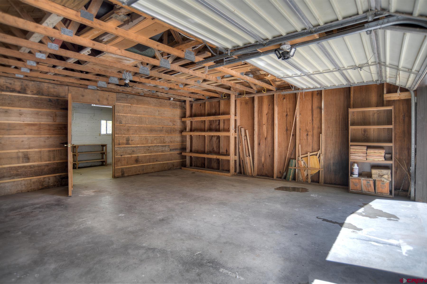 207 Verde Lane Durango, CO 81301 - Photo 33 of 45 a view of an empty room with a staircase