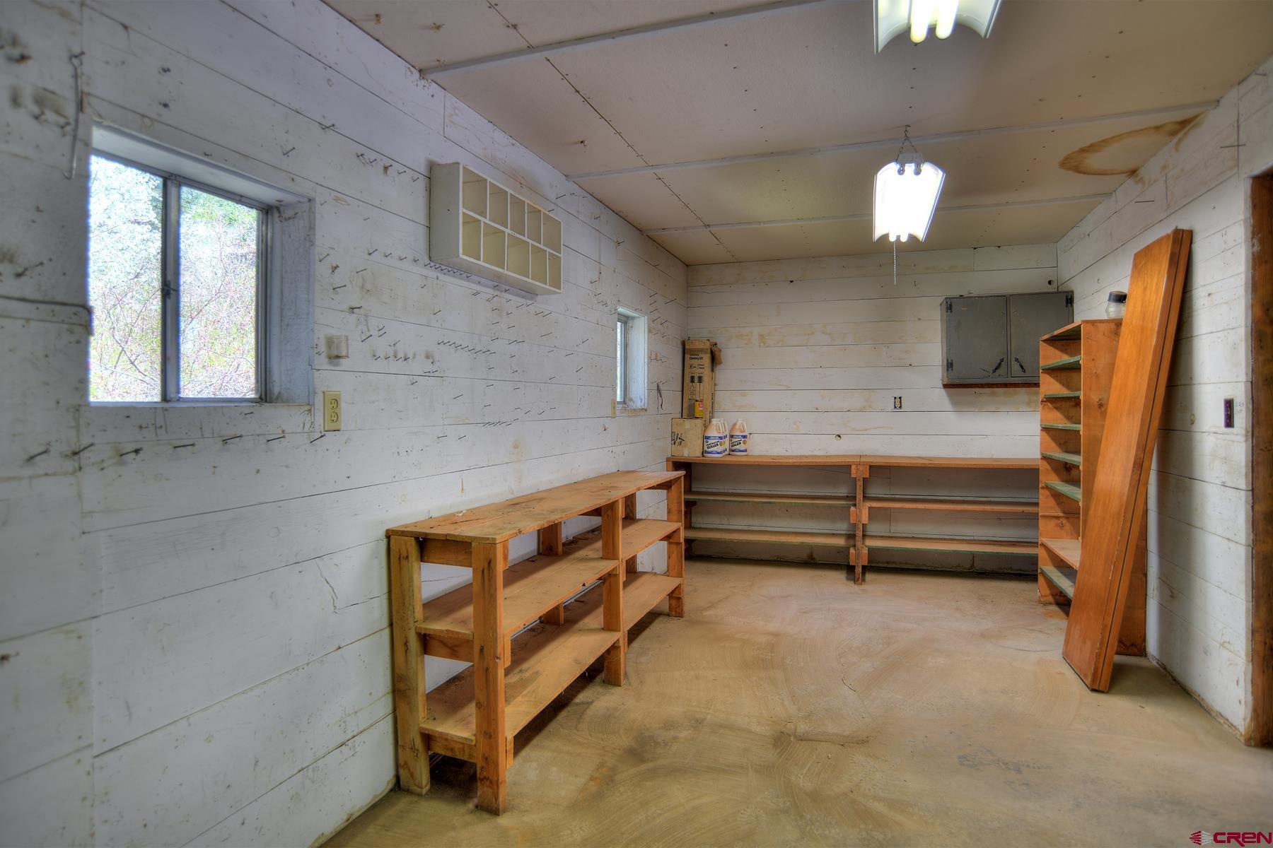 207 Verde Lane Durango, CO 81301 - Photo 35 of 45 a storage room with cabinets