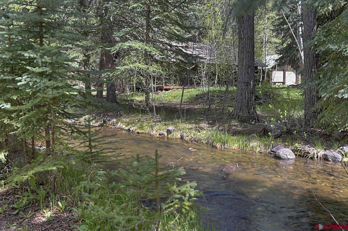 207 Verde Lane Durango, CO 81301 - Photo 38 of 45 a view of a lake with a tree