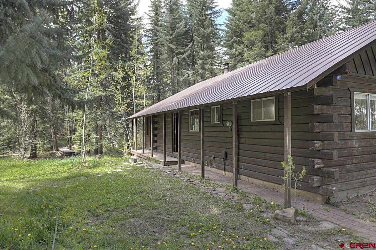 207 Verde Lane Durango, CO 81301 - Photo 4 of 45 a backyard of a house with table and chairs