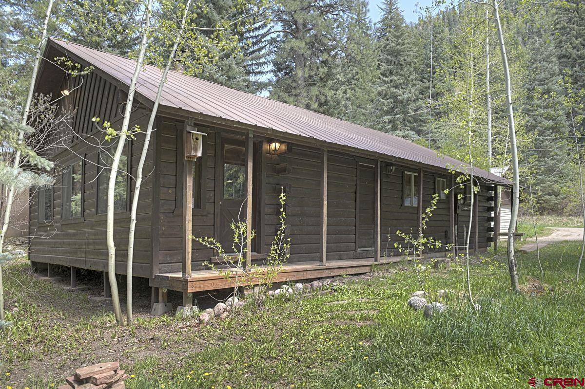 207 Verde Lane Durango, CO 81301 - Photo 5 of 45 a backyard of a house with lots of green space