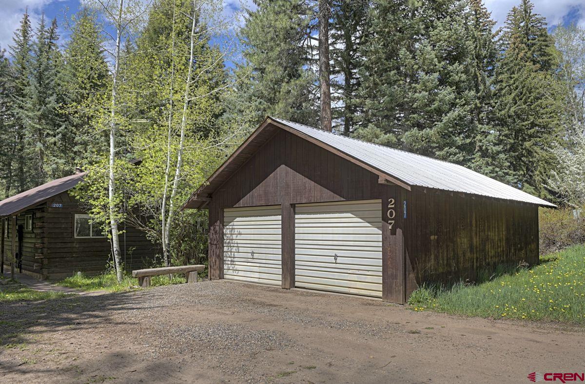207 Verde Lane Durango, CO 81301 - Photo 6 of 45 a backyard of a house with lots of green space