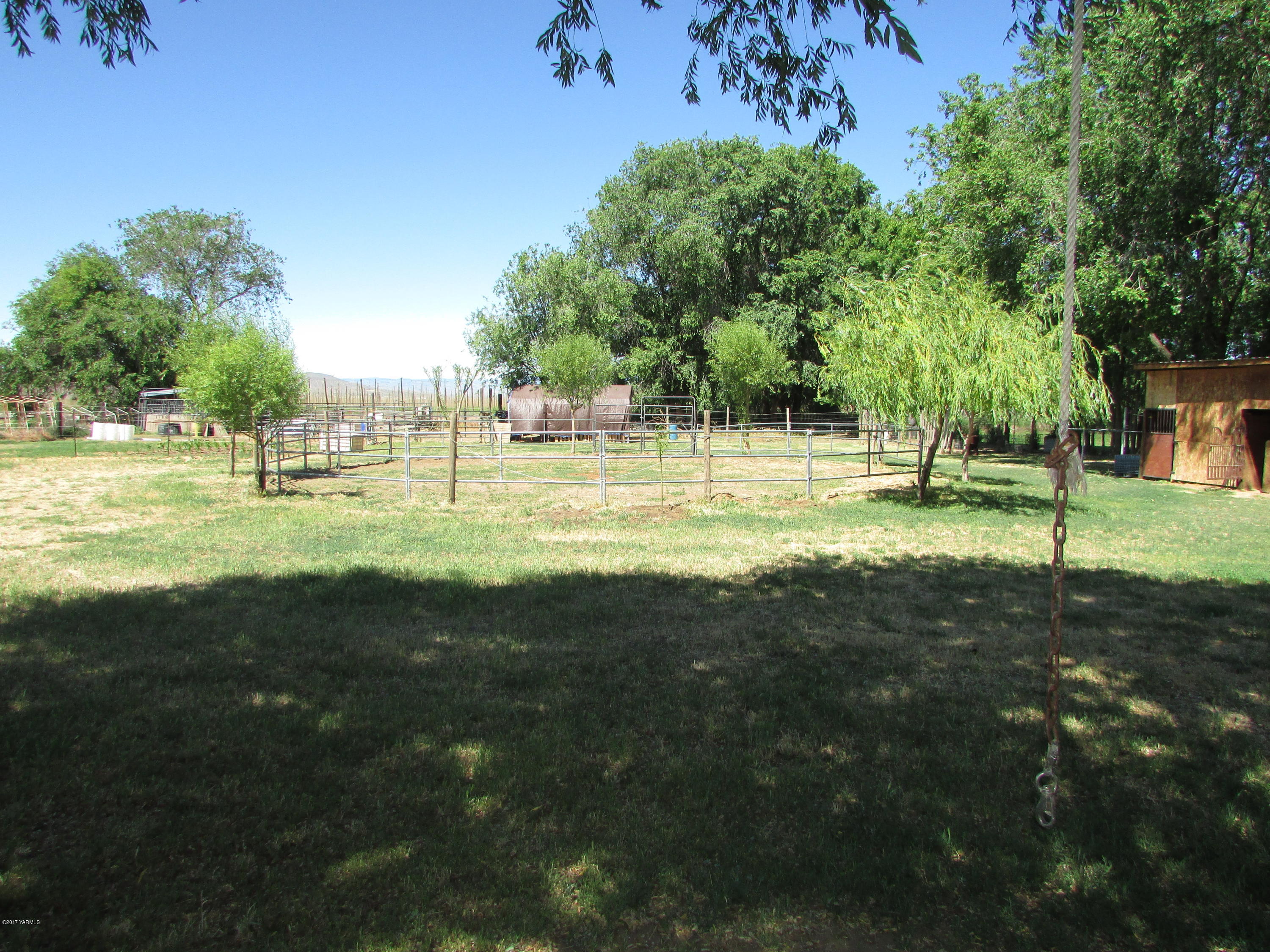 2912 Beaudry Road Moxee, WA 98936 - Photo 9 of 20 a view of a park with swings and slides