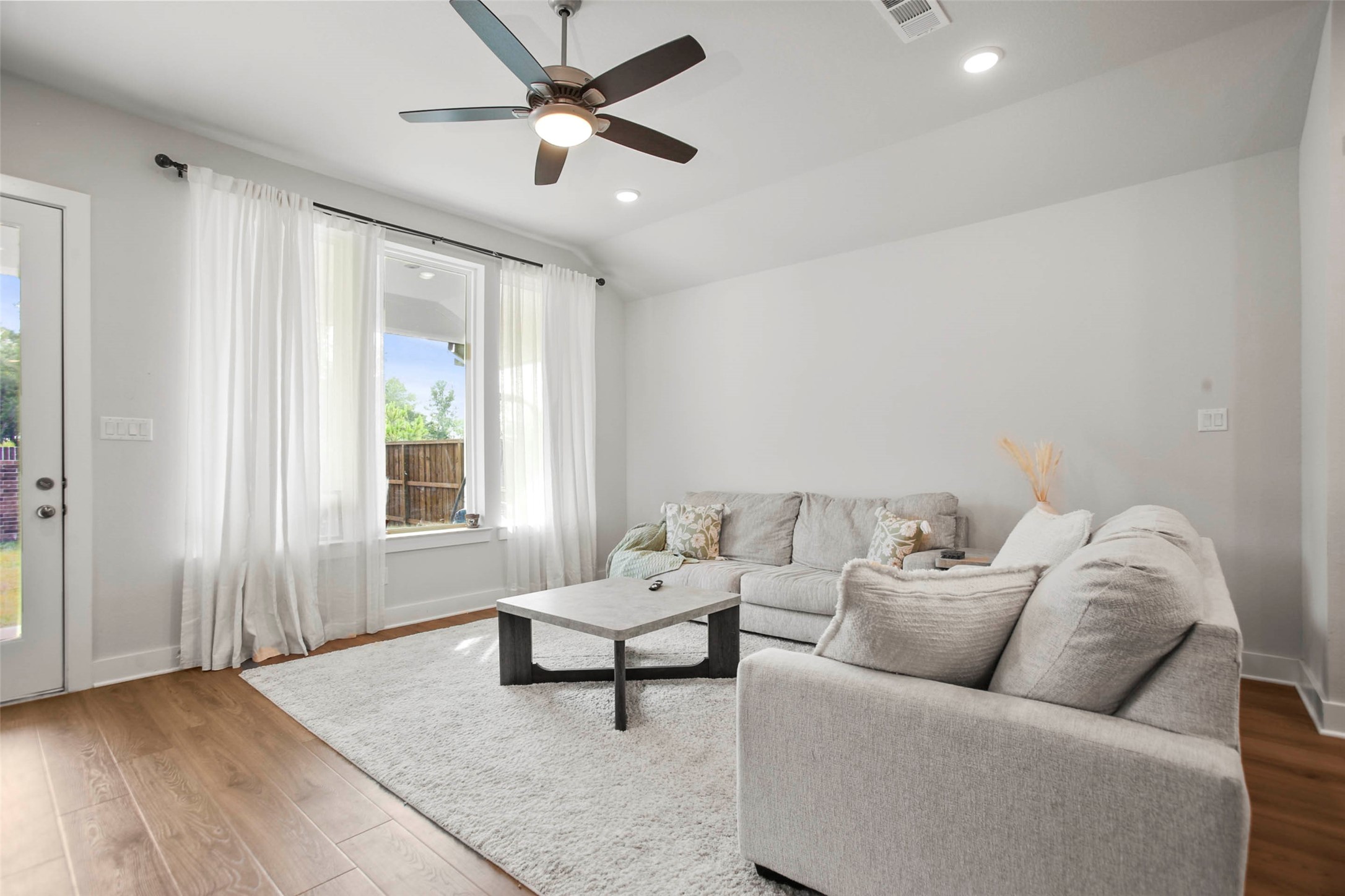 5010 Vly Wind Court Spring, TX 77386 - Photo 11 of 34 a living room with furniture and a window
