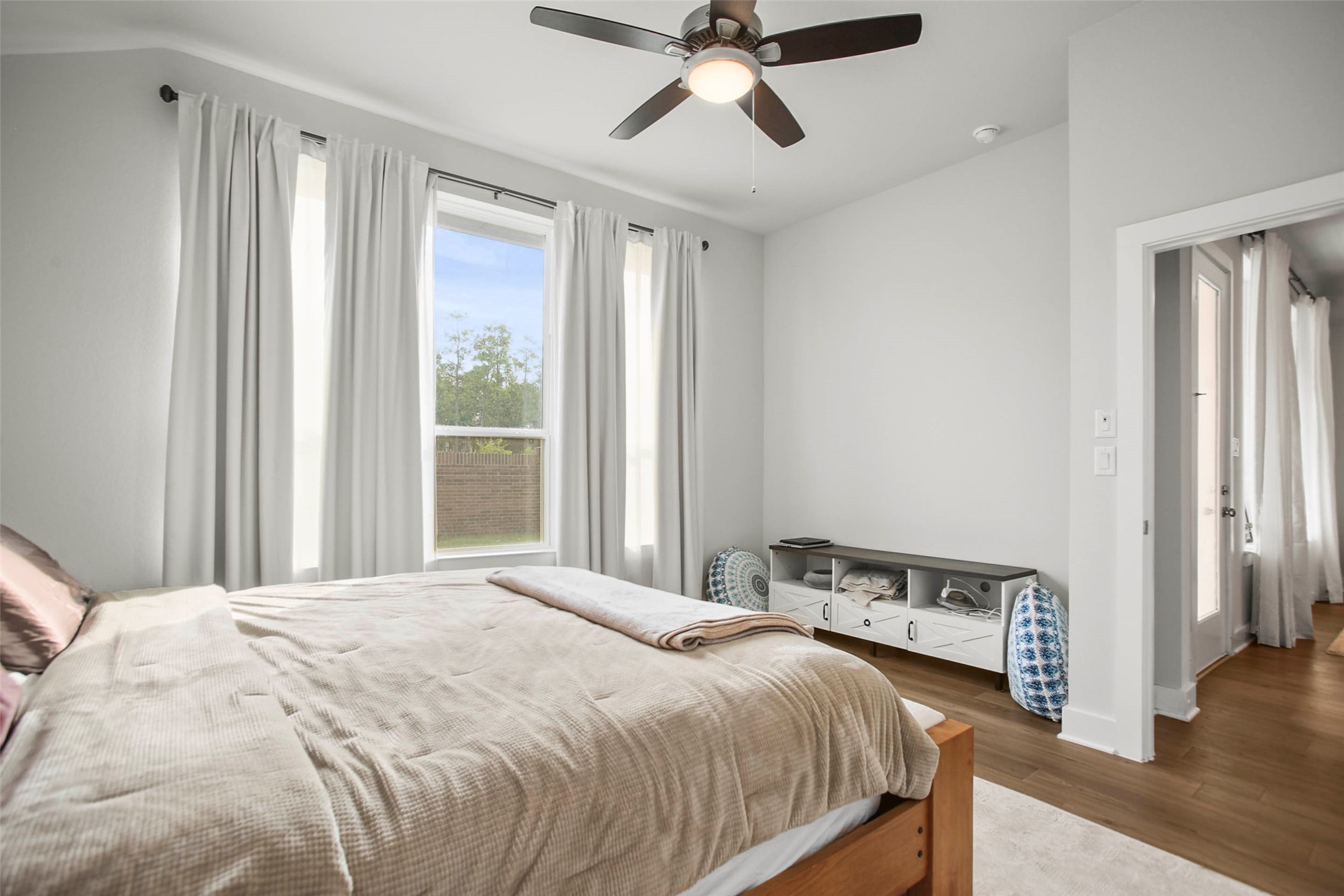 5010 Vly Wind Court Spring, TX 77386 - Photo 19 of 34 a bedroom with a bed and a window