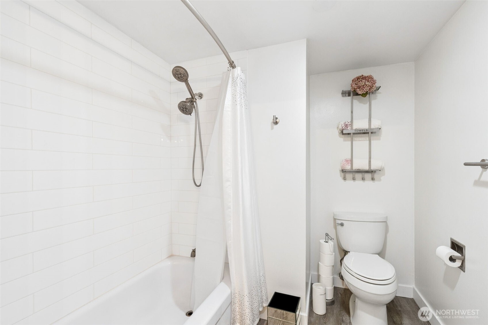 2100 3rd Avenue, Unit 802 Seattle, WA 98121 - Photo 16 of 35 a bathroom with a toilet and a shower