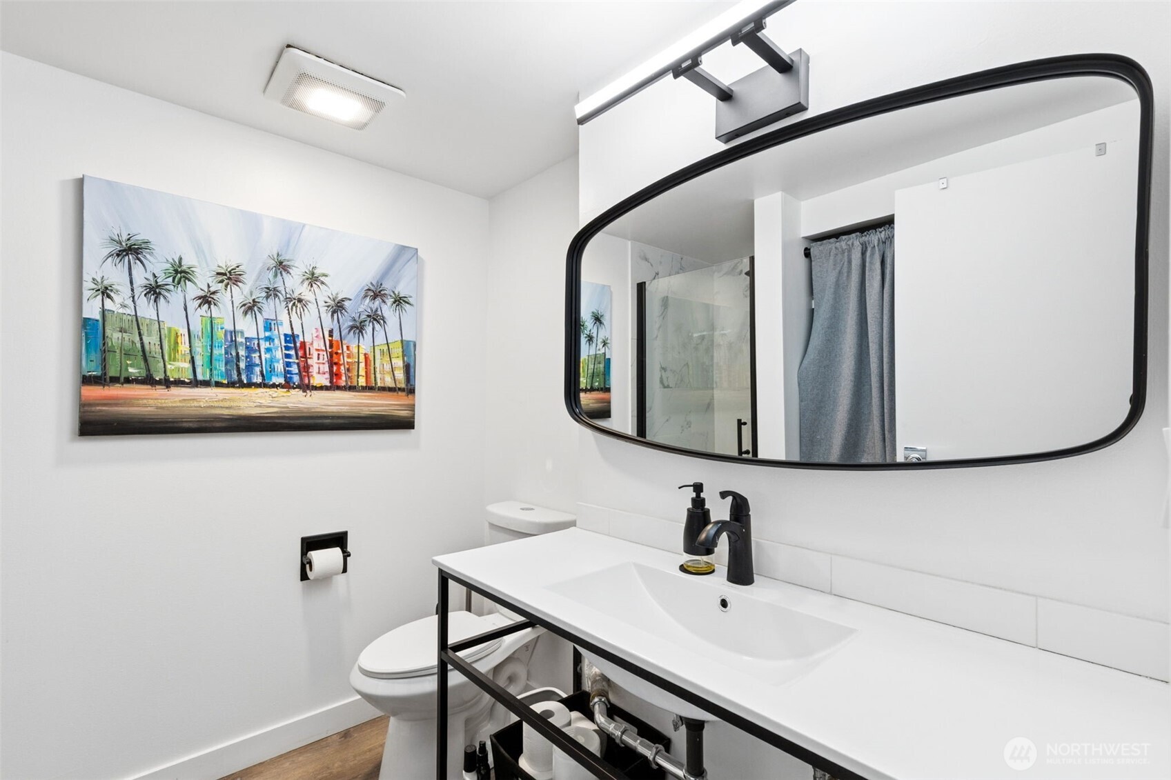 2100 3rd Avenue, Unit 802 Seattle, WA 98121 - Photo 20 of 35 a bathroom with a sink mirror and vanity