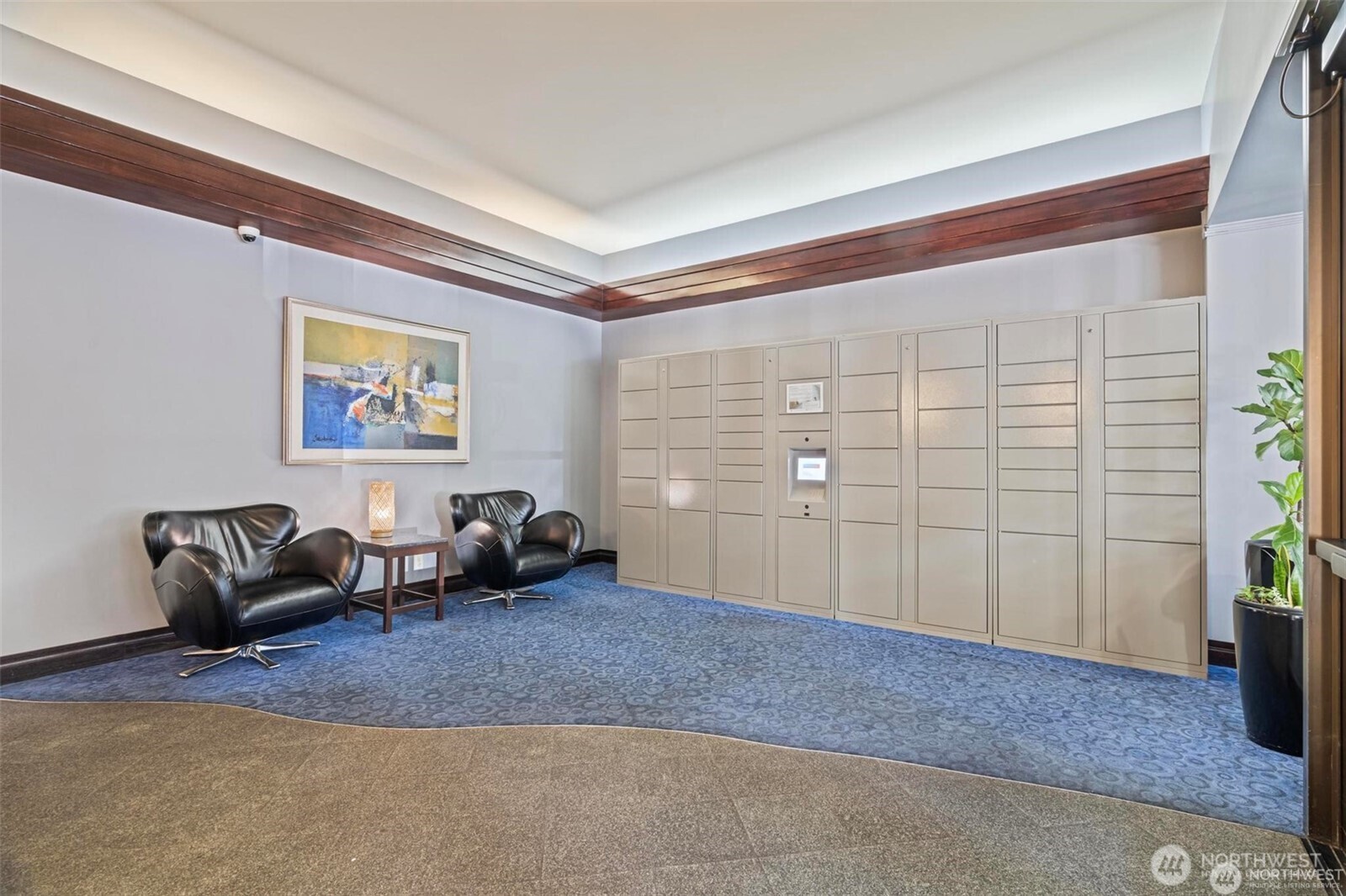 2100 3rd Avenue, Unit 802 Seattle, WA 98121 - Photo 25 of 35 a living room with furniture and painting on the wall